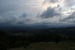 A mostly cloudy sky with distant pockets of rain was a common scene on the trails earlier this summer.